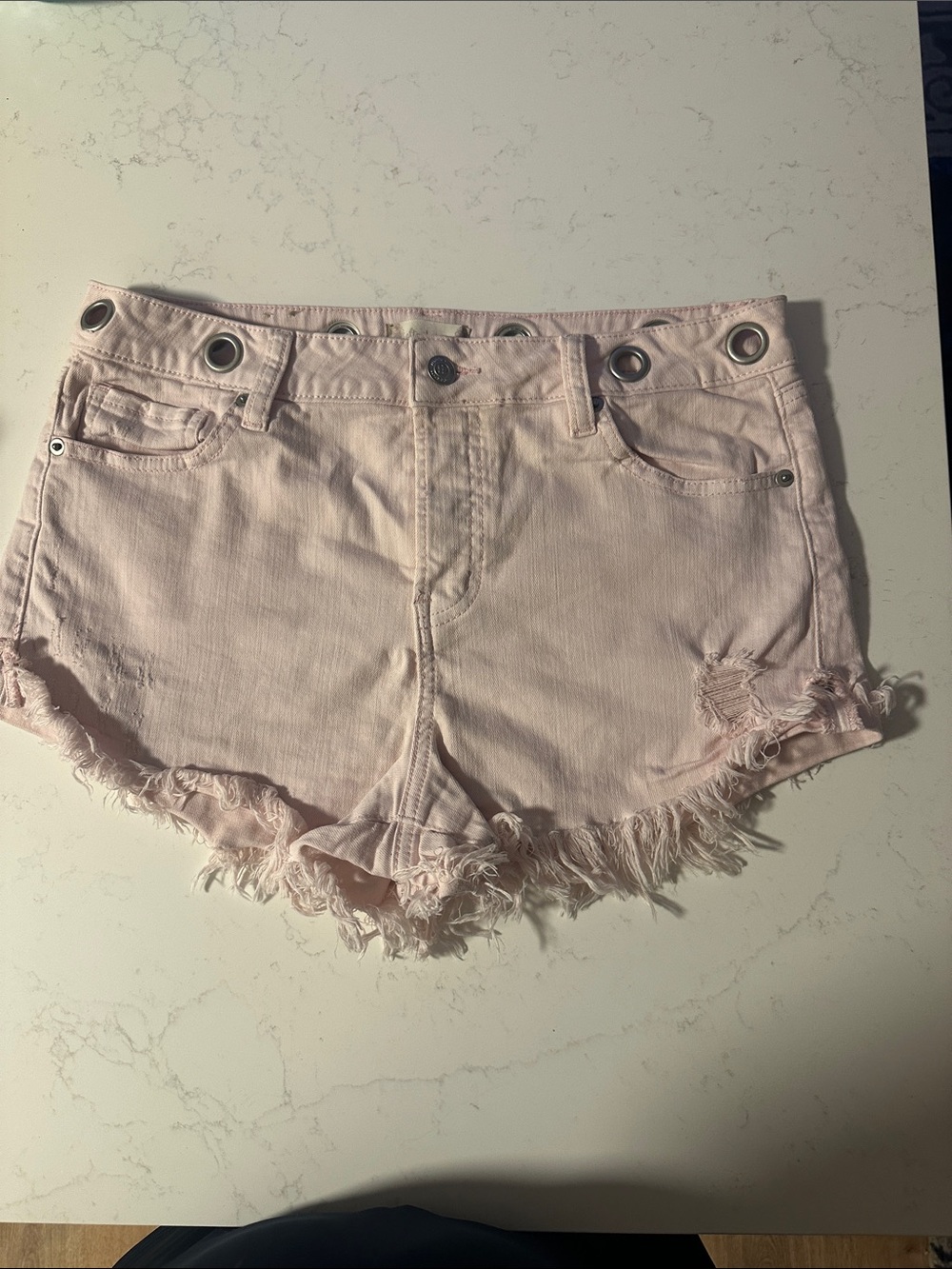 Altar'd State Pale Pink Distressed Denim Shorts with Grommet Waist